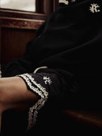 SHORTS WITH KNITTED OLIVES